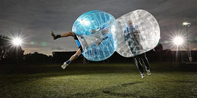 People playing bubble soccer