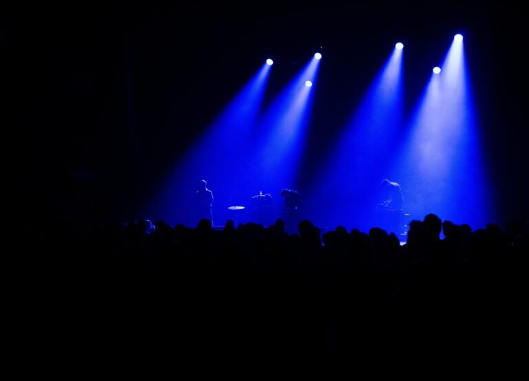 Blue lights illuminating the dancefloor.